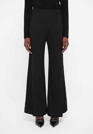 EVIE TROUSERS - Püksid - black