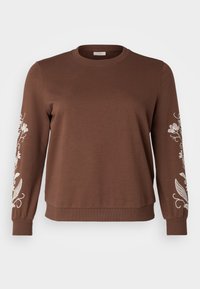 Felpa marrone realizzata in tessuto morbido, con maniche lunghe e ricami floreali bianchi lungo entrambe le maniche. Collo rotondo e polsini a coste.