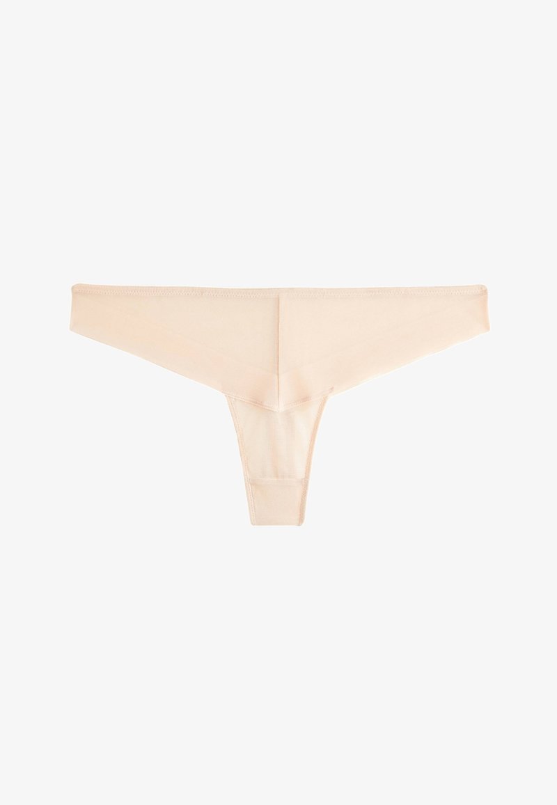 String beige en tissu lisse, doté d'un design minimaliste, de côtés étroits et d'une finition sans coutures pour un confort optimal et un port discret.