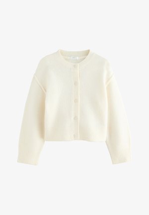 Krem kardigan od mekog materijala, s okruglim izrezom, zatvaranjem na gumbe te rebrastim manžetnama i rubom. Skraćeni kroj s opuštenim pristajanjem.