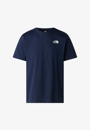 Marineblå bomulds t-shirt med korte ærmer og rund hals. Har et lille hvidt logo på venstre brystområde. Glat stofstruktur.