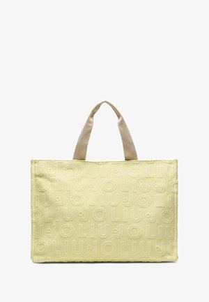 Sac fourre-tout jaune avec motif embossé "LIU JO", doté de courtes poignées beiges et d'une forme rectangulaire. Texture lisse.