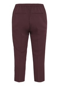 Pantalon marron foncé fuselé avec taille élastique et deux poches passepoilées à l'arrière, vu de dos.