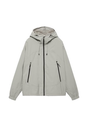 Jasnoszara kurtka z kapturem, zapinana na przedni zamek błyskawiczny, z dwoma pionowymi kieszeniami na zamek, regulowanymi sznurkami kaptura oraz elastycznymi mankietami.