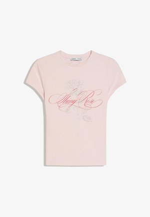Light pink short-sleeve T-shirt with a rhinestone rose design and red cursive text reading "Shiny Rose" on the front.