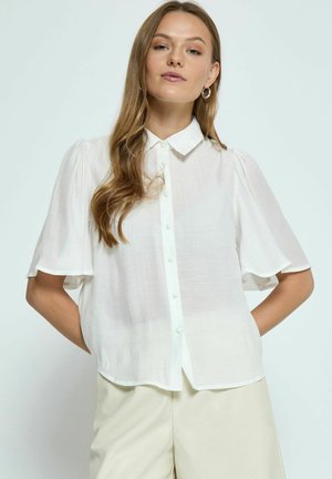 White short-sleeve blouse with a button front, collared design, and soft, lightweight fabric. Features subtle gathered accents at shoulder seams.