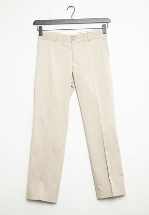 Vaaleat puuvillahousut suoran leikkauksen, joissa on vyötärö vyölenkeillä ja kaksi etutaskua. Kaksi napp closure vyötäisellä.