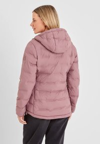 Puffer jacket in dusty rose color, featuring a hood, quilted texture, and zippered pockets. Side view shows smooth lines and a fitted silhouette.