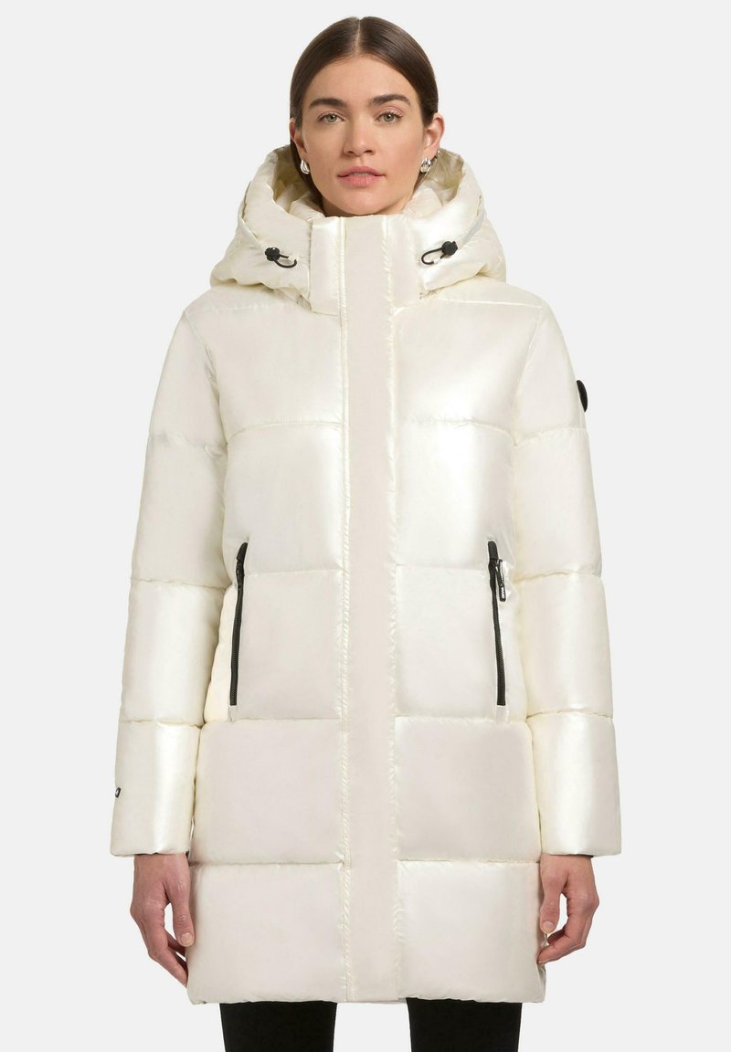 Padded white parka jacket with a shiny finish, hood, zippered side pockets, and black zipper accents. Square quilted design throughout.