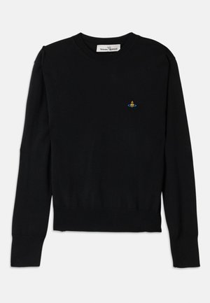 Black knit sweater featuring a round neckline and ribbed cuffs and hem. A small colorful emblem is positioned on the chest.