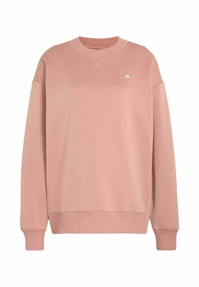 Støvet lyserød sweatshirt med rund hals, lange ærmer, ribstrikkede manchetter og kant samt en lille lys logo øverst til venstre på brystet.