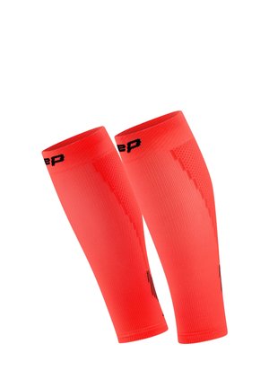 Bright red compression calf sleeves with black logo detail at the top, designed for athletic support and performance.