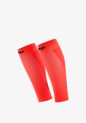 Bright red compression calf sleeves with black logo detail at the top, designed for athletic support and performance.