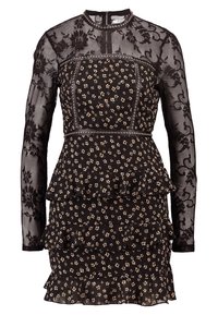 Schwarzes Kleid mit Blumenmuster, durchsichtigen Spitzen-Ärmeln, Rüschensaum und strukturiertem Oberteil, verziert mit metallischen Akzenten und Details.