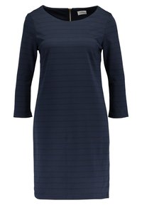 Robe bleu marine à manches trois-quarts, à rayures horizontales, avec un col rond et une fermeture éclair au dos. Fabriquée dans un tissu lisse et extensible.