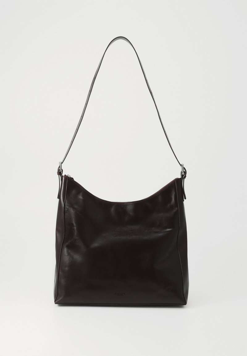 Dark brown smooth leather shoulder bag with long strap and slightly slouched rectangular shape on white background.
