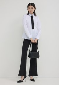 Calliope A ZAMPA  - Pantaloni - nero