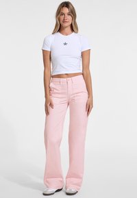 Guess Jeans WIDE  - Široke nogavice - rose