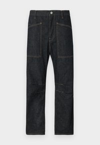 Σκούρο τζιν παντελόνι με ευθεία γραμμή, που διαθέτει δύο μεγάλες μπροστινές τσέπες και κίτρινο ραψί μοτίβο αντίθεσης κατά μήκος των ραφών.