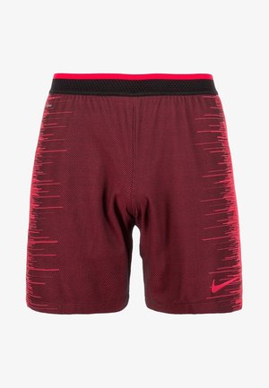 Maroonfarbene Sportshorts mit schwarzen und roten gemusterten Seiten, schwarzem Bund und pinkfarbenem Nike-Logo am unteren rechten Bein.