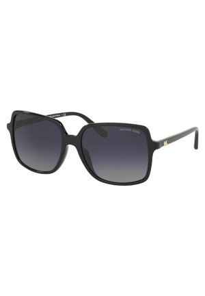 Black oversized sunglasses with gradient lenses, featuring a square shape and a sleek design. Gold logo accent on the side.