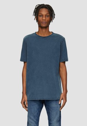 Korte mouwen blauwe T-shirt, gemaakt van zachte katoen, heeft een ronde halslijn en een ontspannen pasvorm; subtiele textuur met een gewassen uitstraling.