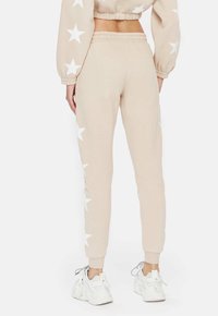Cardio Bunny Tracksuit bottoms - beige
