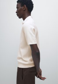 Massimo Dutti Poloshirt - light yellow