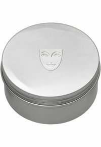 Silbernes Metallblech mit einer glatten, reflektierenden Oberfläche. Runde Form mit einem gemusterten Rand und einem erhabenen Designs auf dem Deckel.