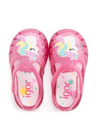 Pink, glittery plastic sandals featuring cut-out design, unicorn graphic, and star print on the insole. Brand name "Igor" visible.