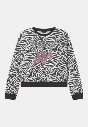 Sweatshirt à imprimé zèbre noir et blanc avec poignets, col et ourlet noirs, présentant un triangle gris et le texte rose "GUESS ICON" sur le devant.