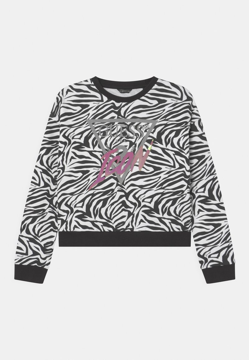 Sweatshirt à imprimé zèbre noir et blanc avec poignets, col et ourlet noirs, présentant un triangle gris et le texte rose "GUESS ICON" sur le devant.