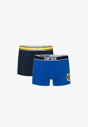Twee paar korte boxershorts; de ene marineblauw met een gele tailleband, de andere felblauw met een zwarte tailleband en logodetail.