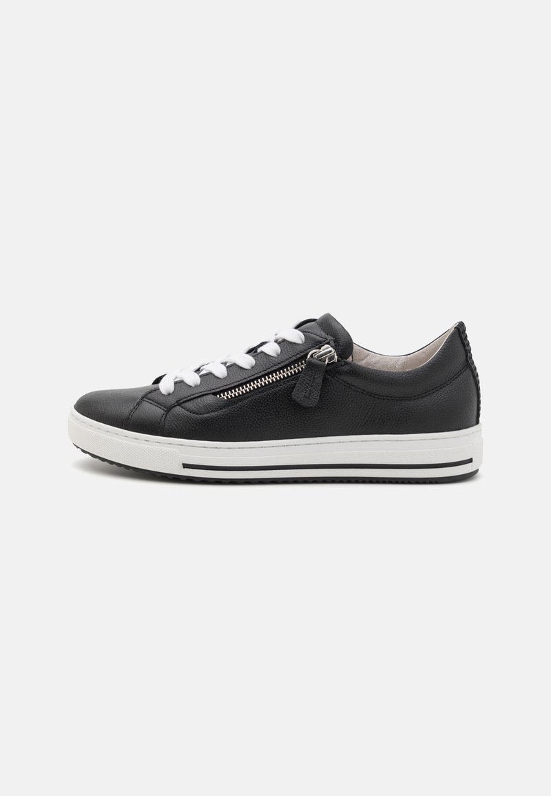 Black leather sneakers with white laces, silver zipper detail, textured surface, and a white sole with black stripe accents.