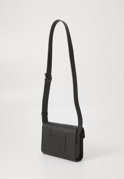 Black leather crossbody bag with a textured finish, rectangular shape, adjustable strap, and a front pocket featuring debossed logo detail.