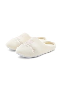 Zachte crèmekleurige slippers met een gladde stofstructuur, voorzien van roze geborduurde tekst en een gesloten achterkant voor comfort.