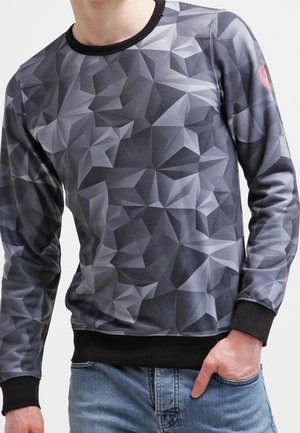 Sweatshirt à manches longues avec un motif géométrique noir et gris. Tissu doux avec des poignets et un col côtelés. Coupe décontractée.