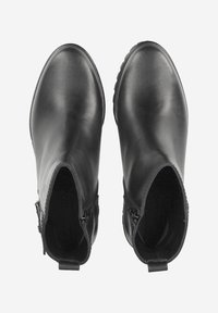 Black leather ankle boots with a smooth finish, featuring side zippers and a textured sole for grip.