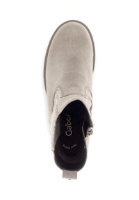Ankle boot in light gray suede with a rounded toe, side zipper, and a soft textile lining. Features a low, textured rubber sole.