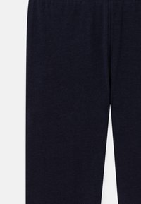 Navy blue lounge pants with a soft texture, elastic waistband, and straight-leg design. Fabric appears smooth without patterns or accents.