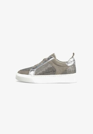 Light grey suede sneaker with metallic silver accents, perforated design, white rubber sole, and flat laces. Rear tab for easy wear.