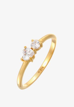 Gold-plated ring featuring two clear round cubic zirconia stones, set in four-prong mounts, with a smooth band marked "925."