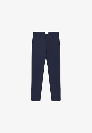 Jūras zilas bikses, izgatavotas no gludas auduma, ar sānu kabatām, rāvējslēdzēju un vienu pogu josta.