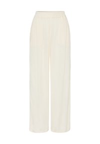 Loose-fit cream-colored pants with an elastic waistband, made from lightweight, slightly textured fabric, displayed on a white background.