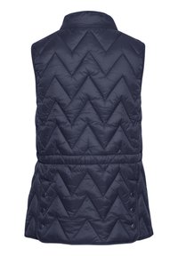 Gilet trapuntato blu navy con motivo a zigzag, colletto alto e vita stretta. Presenta chiusure a pressione e una consistenza liscia e lucida.