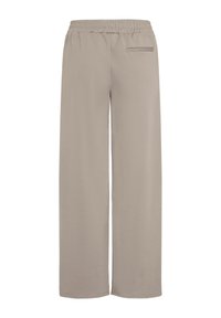 Široke hlače iz lahkega bež materiala z elastičnim pasom in enim zadnjim žepom. Gladka tekstura; preprost dizajn.
