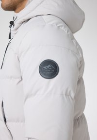 CLOSURE London RACER PUFFER - Jachetă de iarnă - stone