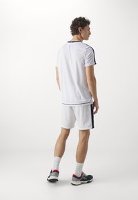 Fila SHORTS JAKOB - Sports shorts - white/navy