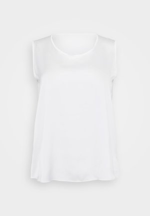 White sleeveless top with a smooth texture, v-neckline, and relaxed fit. Slightly curved hem and side slits for enhanced movement.