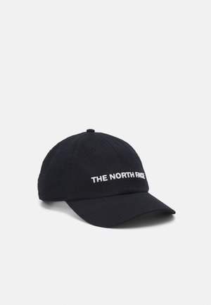 Casquette de baseball noire ajustable avec visière incurvée et "THE NORTH FACE" brodé en blanc sur le panneau avant.
